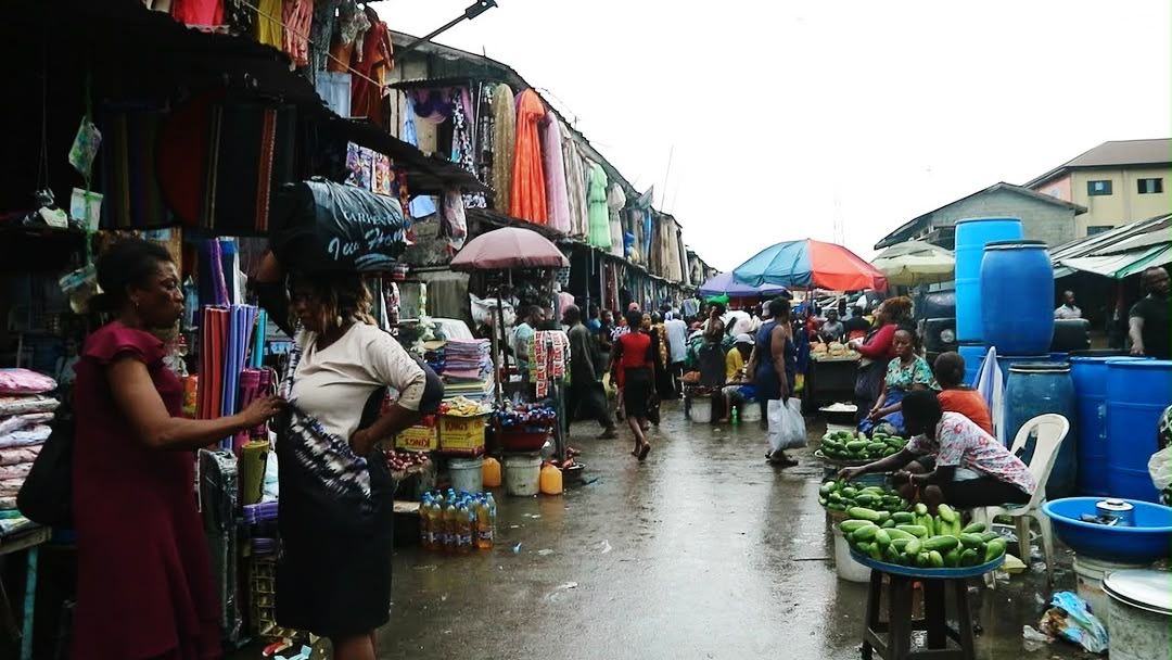 A busy market street in Port Harcourt after the rain